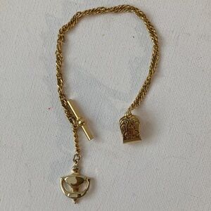 Vintage gold filled watch chain with door knocker fob and t-bar. 9in in length